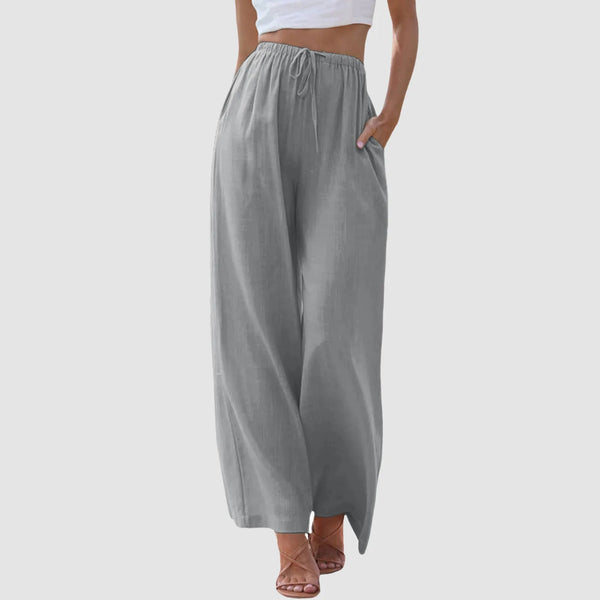 Comfortable cotton-linen wide-leg pants with functional pockets and customizable strap fit