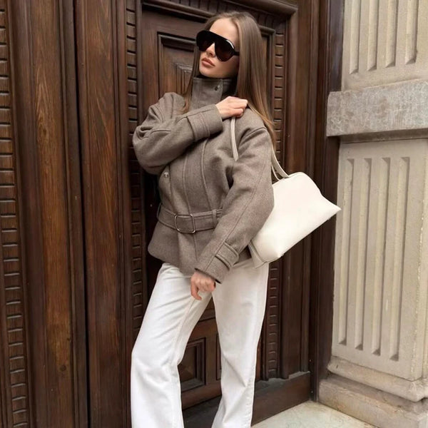 Loose-fit polyester jacket with adjustable sash belt and elegant turtleneck collar