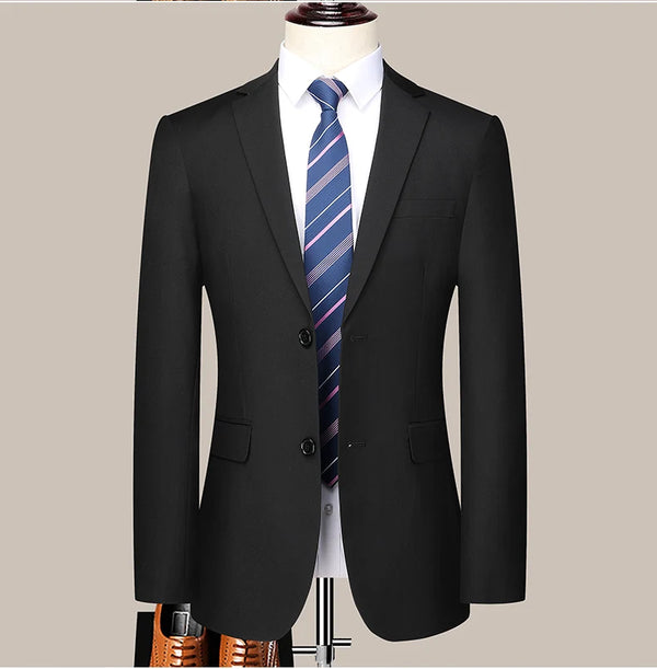 Elegant suit laid flat, displaying the blazer and trousers together.