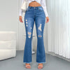 Chic light blue ripped flared jeans for women with high waist, deep pockets, and retro style for versatile fashion.