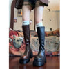 Chic black platform knee-high fashion boots with wedge heel, waterproof design, and bling accents for stylish women.