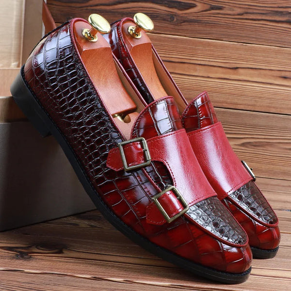 Sleek pointed toe design of elegant men's loafers in patent leather.