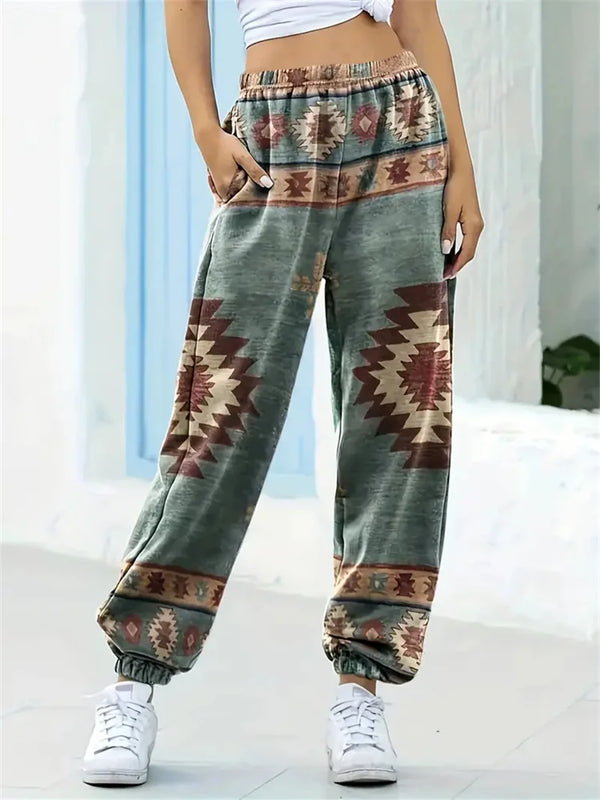 Chic high-waist joggers with 3D geometric print, pockets, and elastic drawstring for a comfortable fit in any season.