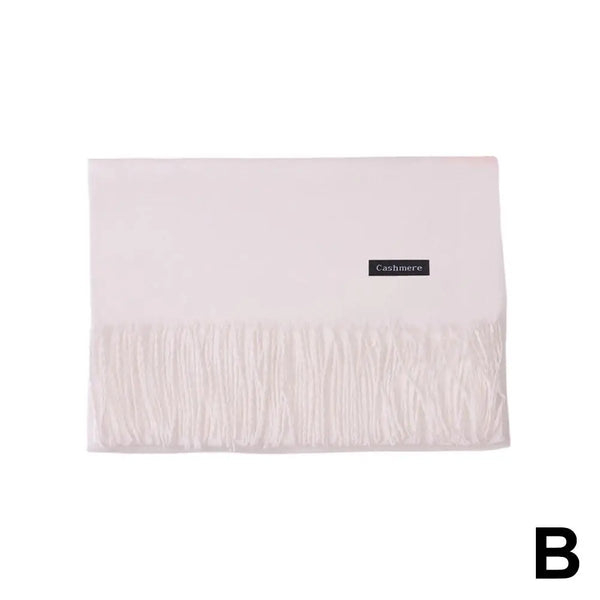 Chic cashmere blend winter scarf in black, adds warmth and style.