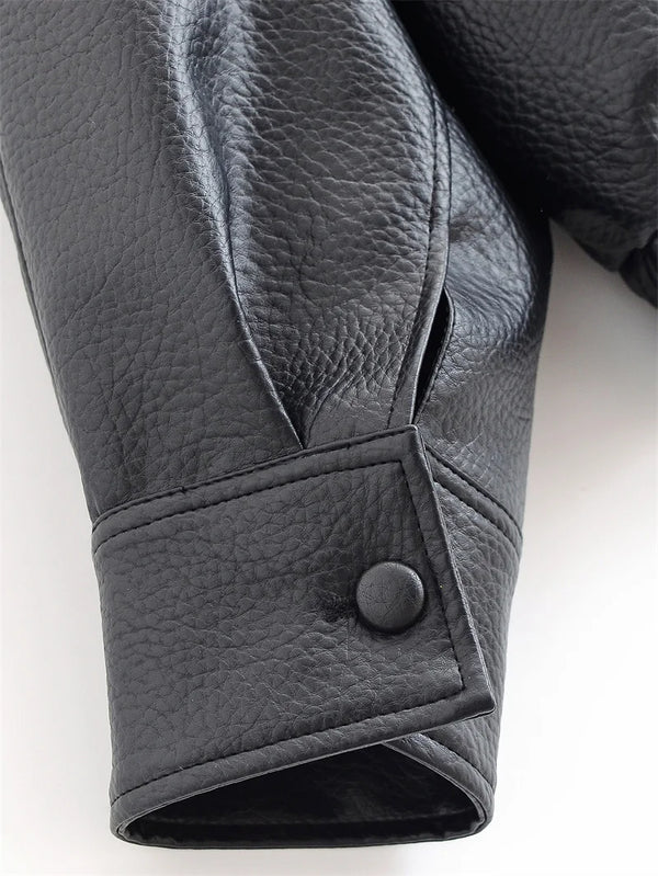 Chic black faux leather moto jacket for women, perfect for autumn evenings and stylish casual wear with a sleek silhouette.