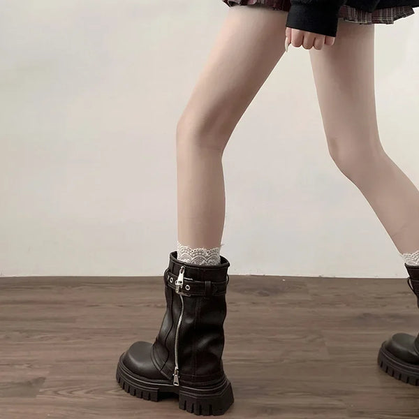 Chic women's mid-calf biker boots with buckle detail, zipper closure, and plush lining for comfort and style in cooler weathe