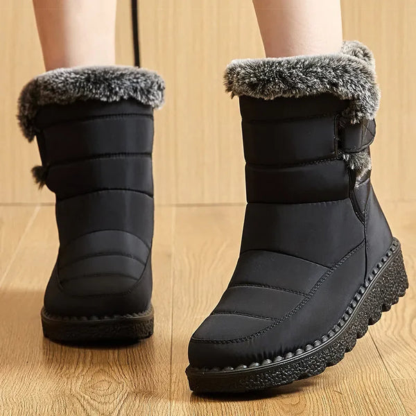 Chic women's waterproof winter boots with plush lining, low heel, and hook-and-loop closure for stylish cold weather comfort.