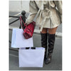 Timeless khaki outerwear with stand collar and flattering silhouette
