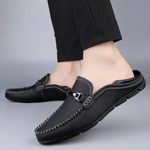 Stylish black leather loafers for men, slip-on design for easy wear.