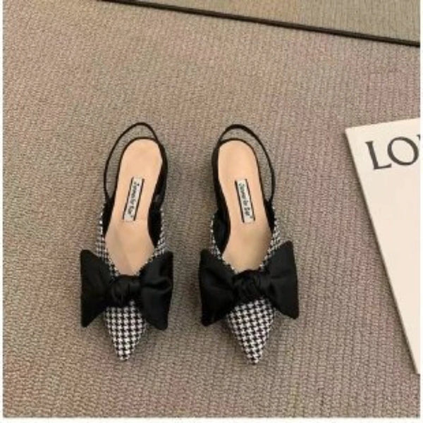 Comfortable pointed flat sandals with secure elastic strap and cushioned insole