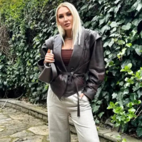 Chic belted leather bomber jacket for women, featuring lace-up detail and hood, perfect for autumn and winter fashion.