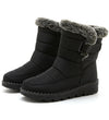Chic women's waterproof winter boots with plush lining, low heel, and durable design for stylish cold-weather comfort.