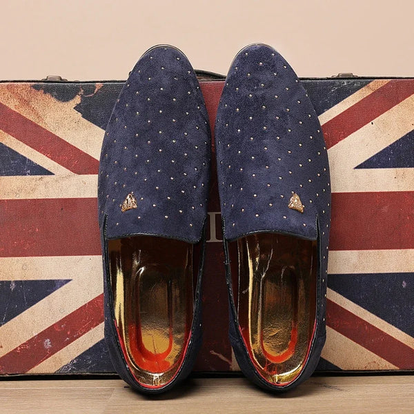 Pointed toe design of elegant suede loafers for men, perfect for business or casual wear.