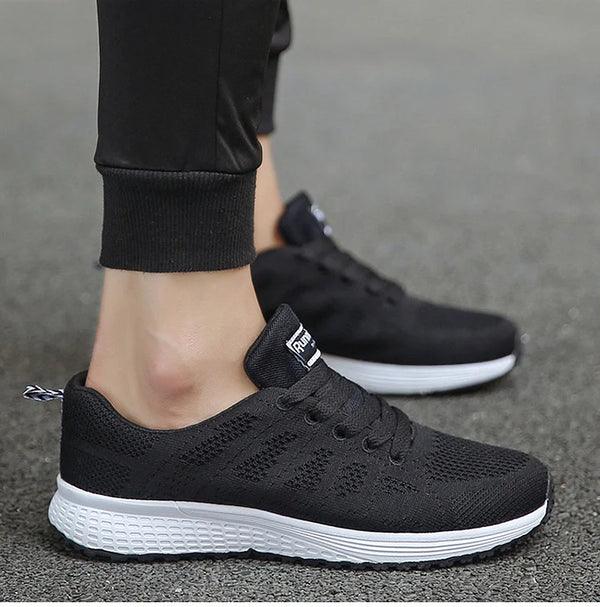 Versatile white athletic sneakers with multi-color accents for everyday wear
