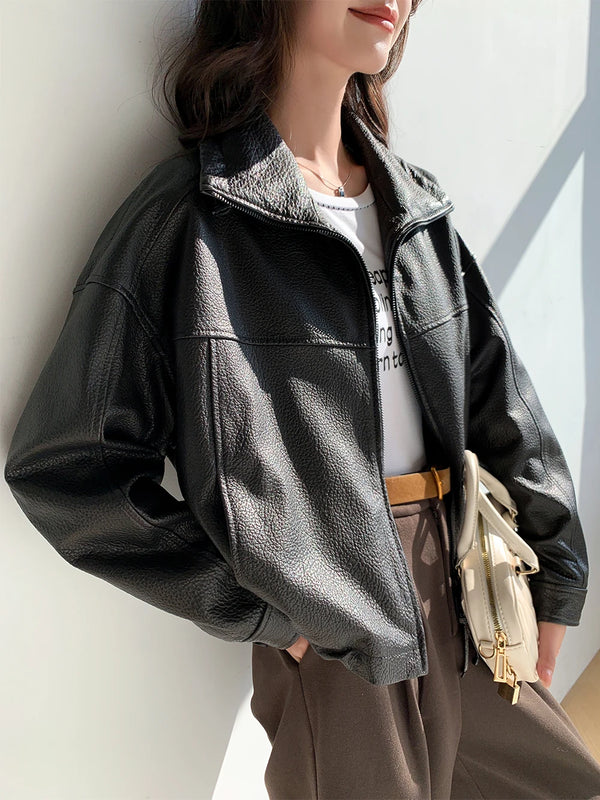 Chic vintage leather cropped jacket for women in a high street fashion style.