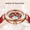 Sapphire crystal of the watch reflecting light, highlighting its premium quality.