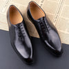 Premium genuine leather business shoes showing detailed craftsmanship and stitching