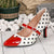 Chic polka dot Mary Jane kitten heels with heart ankle strap, perfect for vintage style and all-season comfort.