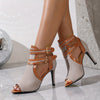 Chic buckle high heels with open-toe design, stiletto lift, and ankle strap for elegance and comfort in formal occasions.