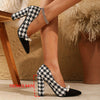 Elegant women's houndstooth pumps with faux pearl accents, pointed toe, and chunky block heel for all-season style.