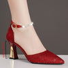 Chic faux pearl block heel pumps with ankle strap, pointed toe design, perfect for weddings and formal events.
