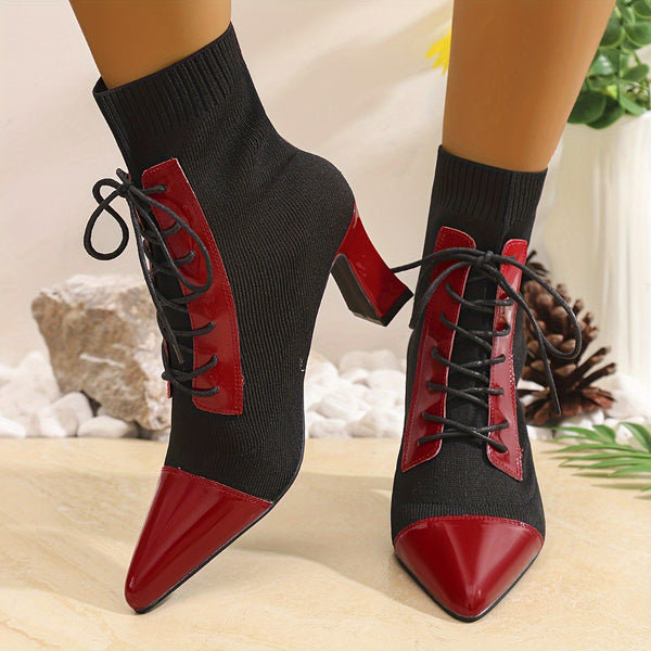 Chic black and red pointed toe lace-up booties with block heel for stylish comfort in all seasons and occasions.