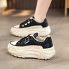 Trendy Lightweight Korean Style Running Shoes in Black, White, and Red with Color-Matching Design suitable for Casual or Athletic Wear.