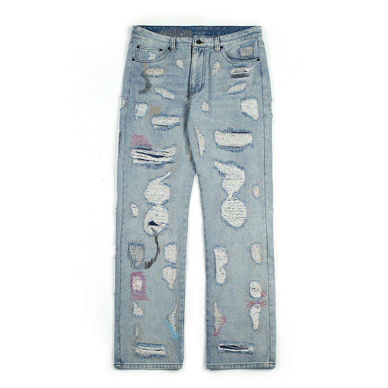 Embroidered ripped vintage jeans trousers