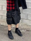 Black Cotton Tactical Shorts with Multi-Zip Detail - Glossy black men's outdoor shorts with multiple zip compartments.