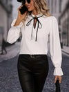 Women's White Ruffle Shirt with Tie Detail and Solid Trim. US Sizes S-XXL. Elegant design for versatile styling.