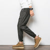 Trendy Urban Striped Cotton Harem Pants for Teens - Low-Waist Loose Fit, Elastic Waistband, Contrast Detailing.