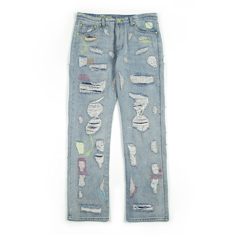 Embroidered ripped vintage jeans trousers