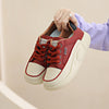 Casual Breathable White Women's Leather Sneakers with Lace-up Design and Waterproof Platform. Durable, Comfortable, and Stylish Footwear for Women.