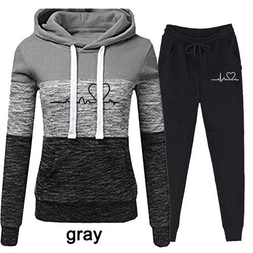 Trendy Two-Piece Tracksuit Set for Women with Cozy Hoodie, Casual Lounge Wear, Fleece Sweater, Polyester Outfit.
