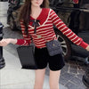 Chic Women's Doll Collar Sweater with Bow Accent in Red. Feminine and versatile pullover with charming bow design.