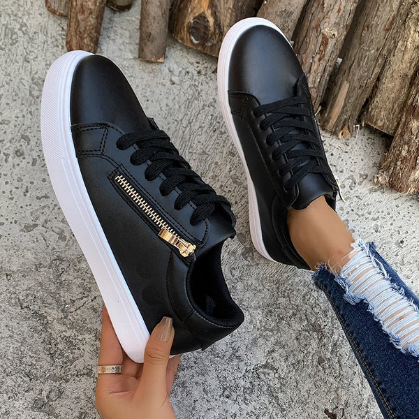 Chic Large Size Flat Sneaker in Black or White for Ladies - Synthetic Leather, Cotton Lined, Low Top Design with Round Toe