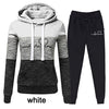 Trendy Two-Piece Tracksuit Set with Cozy Hoodie. Casual, Comfortable Women's Lounge Wear in Various Sizes. Durable Polyester Fleece Sweater Suit.