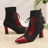 Chic black and red pointed toe lace-up booties with block heel for stylish comfort in all seasons and occasions.