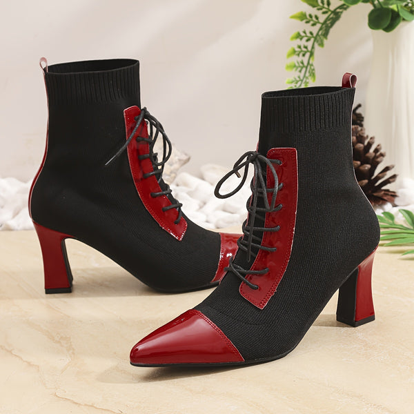 Chic black and red pointed toe lace-up booties with block heel for stylish comfort in all seasons and occasions.