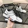 Men's Leather Casual Breathable Sneakers - Winter Wear Shoes, Black White Color Matching, Comfortable Low-Heel Design.