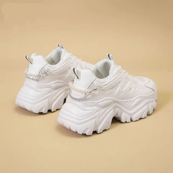 Sleek White Elevator Sneakers with Resin Sole - Low Top Ultra-Thin Design & Ribbon Accent - Women's Fashionable Footwear.