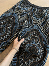 Men's Stylish Seaside Black Flower Print Beach Pants - Casual loose fit for beach adventures, fleece-lined comfort.