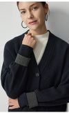 Sophisticated V-neck cardigan crafted from pure wool with classic button-front styling