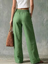 Close-up of functional side pockets on wide leg linen pants