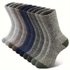 Pair of navy Merino wool socks designed for warmth and comfort in winter.