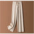 Luxe cashmere blend wide-leg pants for women, featuring a high waist, soft fabric, and comfortable elastic waistband.