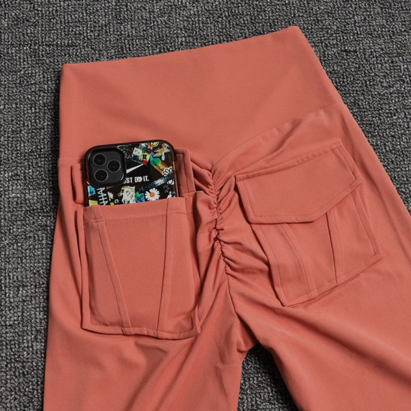 Black breathable workout leggings with pockets, made from durable nylon spandex.