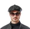 Black leather beret styled with casual autumn outfits for a chic look.