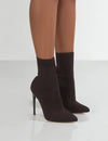 Modern knitted sock boots with breathable fabric and sophisticated stiletto heel