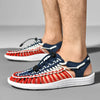 Men's handwoven beach footwear with breathable construction and flat heel